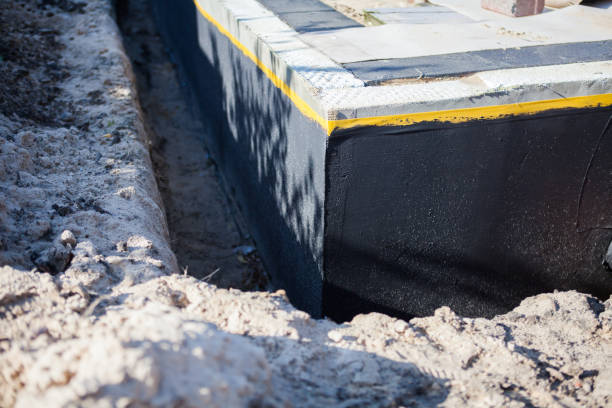 Professional Interior Drainage System technician working in Farnham, NY